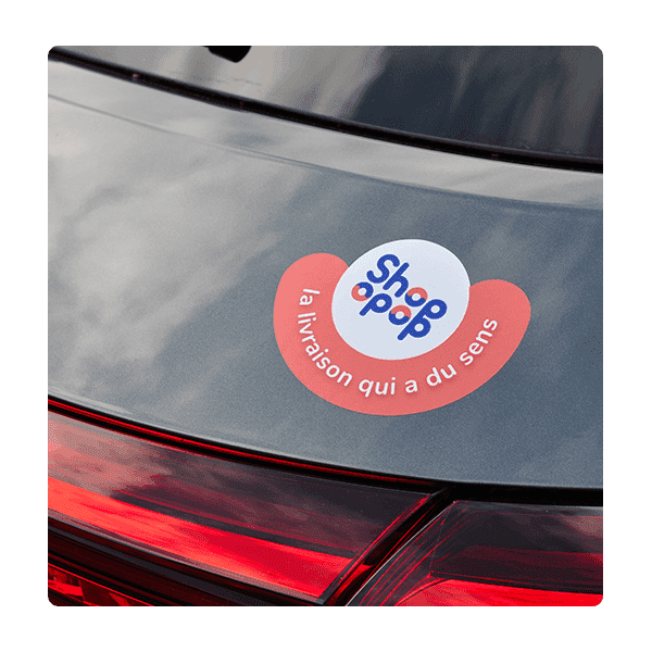 Sticker Shopopop collé sur une voiture